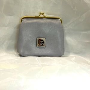 Classic Dooney & Bourke wallet/change purse. Large in size.